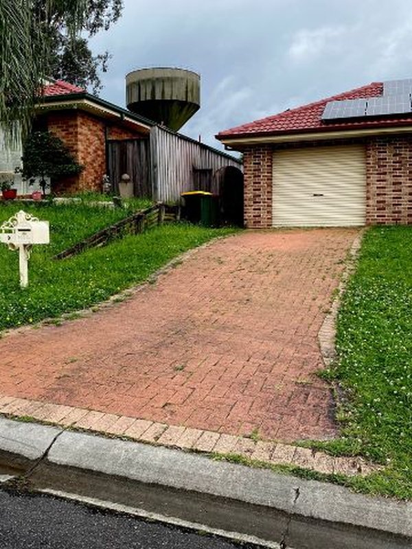 Sydney driveway before pressure washing, covered in built-up dirt and mould